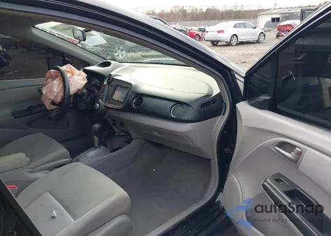 2011 Honda Insight Ex z USA, uszkodzony, nr VIN JHMZE2H74BS007951